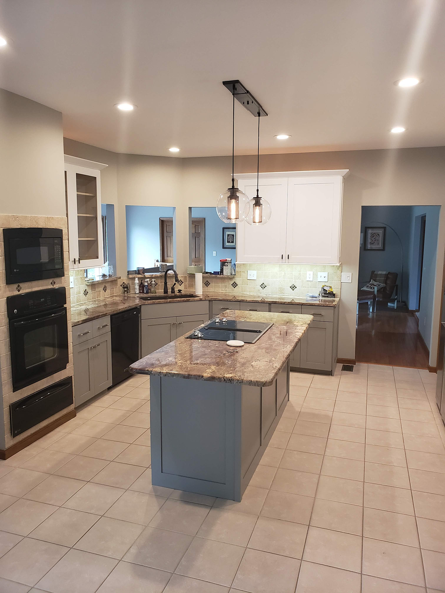 Two-tone kitchen design with custom cabinetry by Professional Wood Interiors